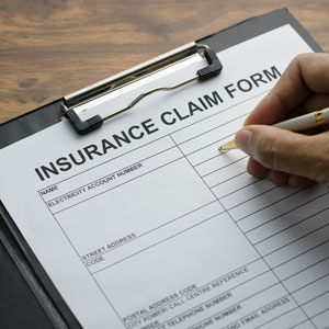 A blank insurance claim form - Robichaux Law Firm, LLC